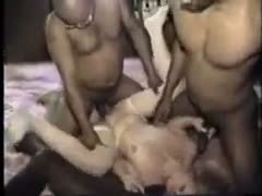 A group of dark-haired men beat up an amateur wife.